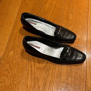 Black leather Prada peg heel shoe